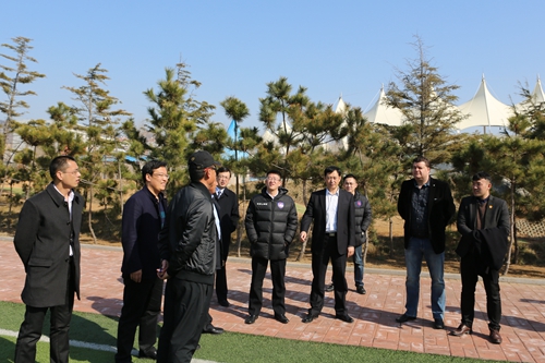 谭旭一行在威海市体育局局长丛华清,副局长于夕皆,威海市政协副秘书长